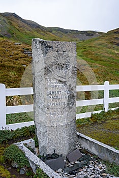 Ernest ShackletonÃ¢â¬â¢s grave at an abandoned whaling station, Grytviken, Antarctica